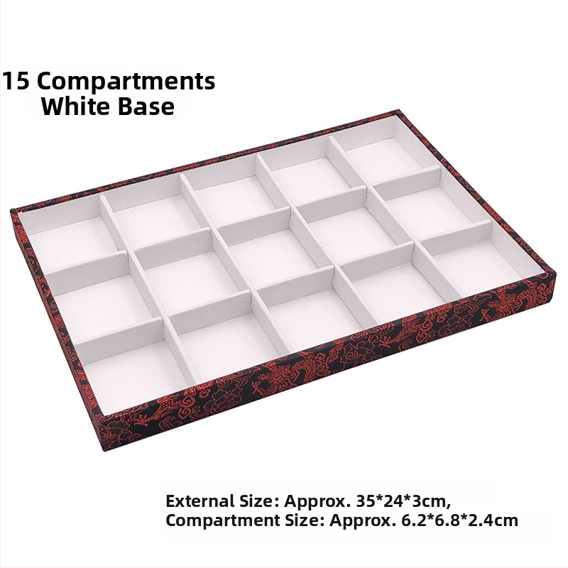 Vienas daļas juvelierizstrādājumu demonstrēšanas plāksne ar 125 nodalījumiem; materiāls: presēta koka plāksne; antīkā stilā; savienojuma konstrukcija