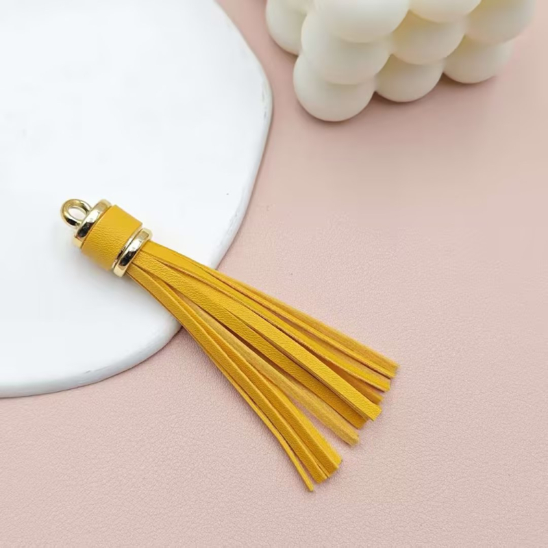 Īdas tassel atslēgu piekārums no KANGHAI | piemērots atslēgu ķēdēm, somām, rotaslietām un automašīnu piekariem | Materiāls: Āda