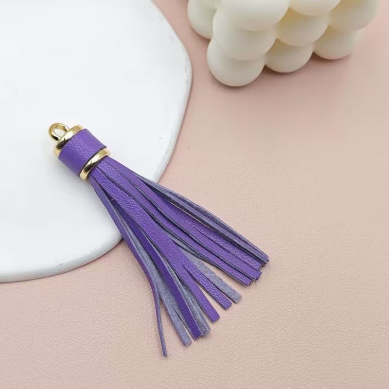 Īdas tassel atslēgu piekārums no KANGHAI | piemērots atslēgu ķēdēm, somām, rotaslietām un automašīnu piekariem | Materiāls: Āda