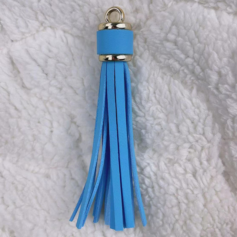 Īdas tassel atslēgu piekārums no KANGHAI | piemērots atslēgu ķēdēm, somām, rotaslietām un automašīnu piekariem | Materiāls: Āda