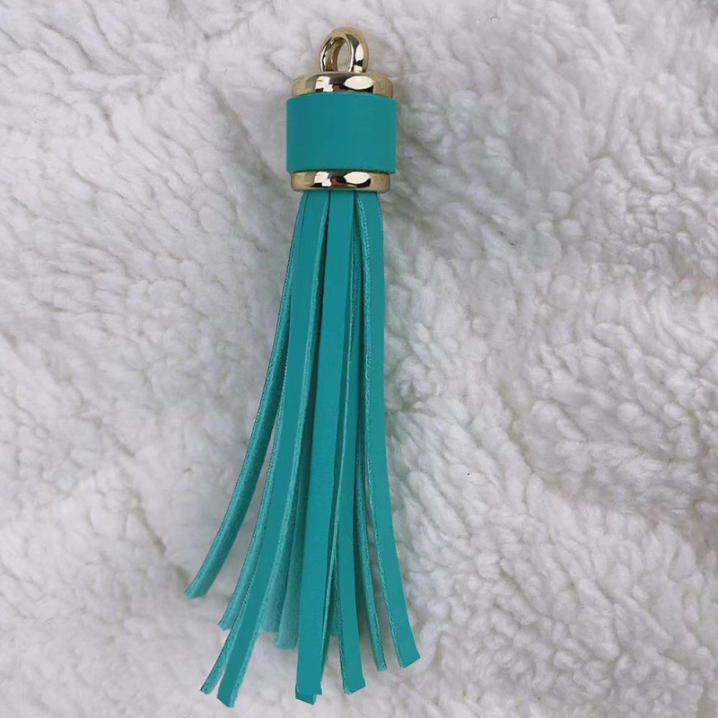 Īdas tassel atslēgu piekārums no KANGHAI | piemērots atslēgu ķēdēm, somām, rotaslietām un automašīnu piekariem | Materiāls: Āda