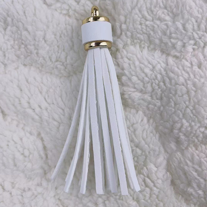 Īdas tassel atslēgu piekārums no KANGHAI | piemērots atslēgu ķēdēm, somām, rotaslietām un automašīnu piekariem | Materiāls: Āda