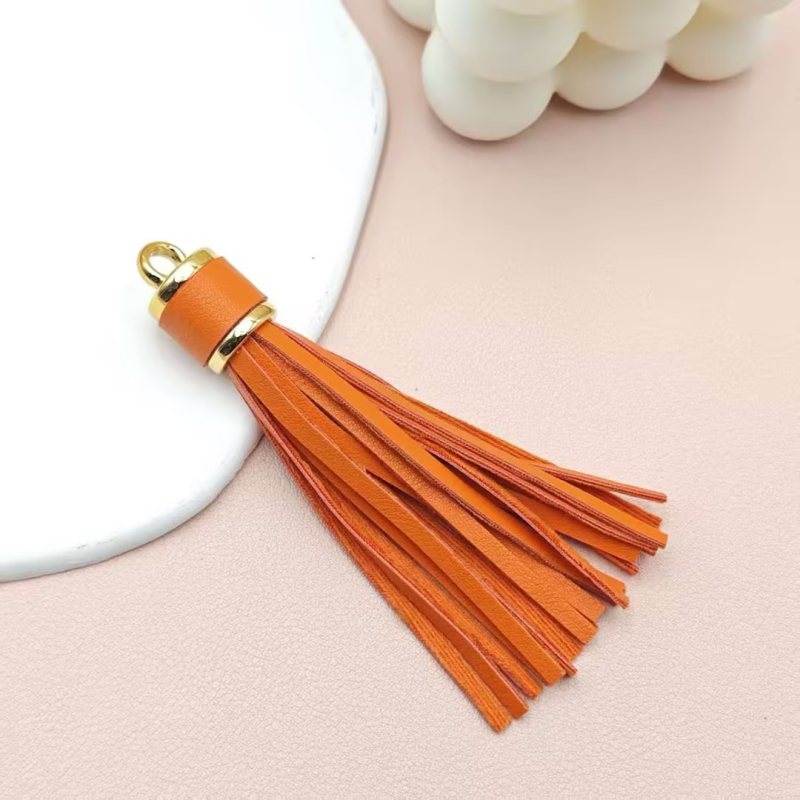 Īdas tassel atslēgu piekārums no KANGHAI | piemērots atslēgu ķēdēm, somām, rotaslietām un automašīnu piekariem | Materiāls: Āda