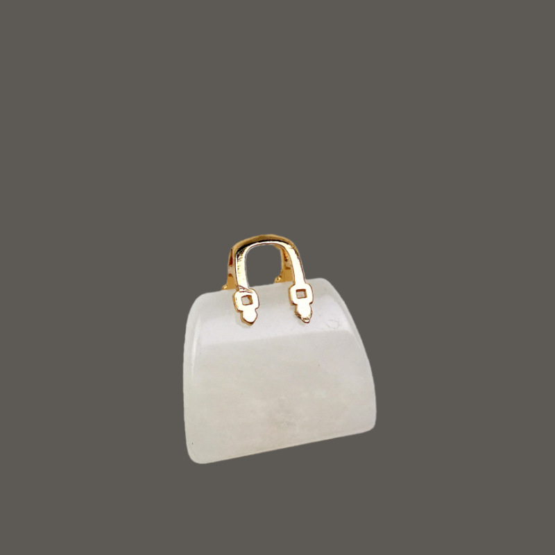 Prirodni kristalni mini torbica – izrezbareni ornament od tigrovog oka