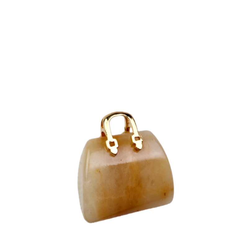 Prirodni kristalni mini torbica – izrezbareni ornament od tigrovog oka