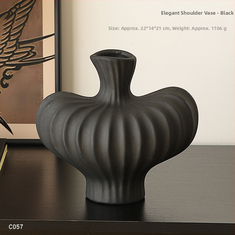 Keramikas galda vāze ar mākslīgiem ziediem — moderns minimālisma dekors dzīvojamai istabai vai ēdamistabai