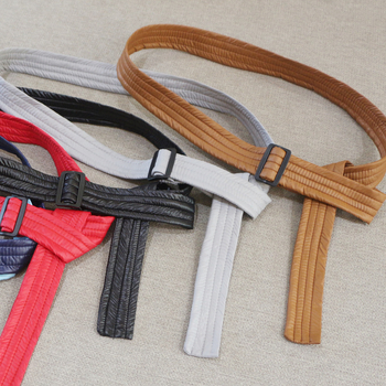 Sieviešu josta kaprtam ar kokvilnas pildījumu, saitēm ar auklu, austā josta ar plastmasas sprādzi, mašīnas dizains, platums 2–4 cm