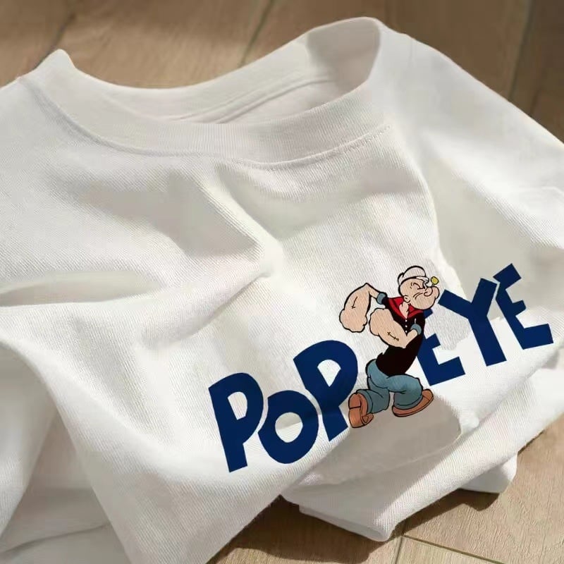 Kokvilnas T-krekls ar īsām piedurknēm, burtiem drukāts, apaļš kakls, brīvs piegriezums (95%+ kokvilna; drukāšana; burti/teksti; parasta garums)