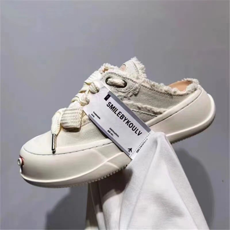 Unisex auduma kurpes ar zemu augšdaļu, priekšējā aizdare ar šņorēm, gumijas zole, bieza zole