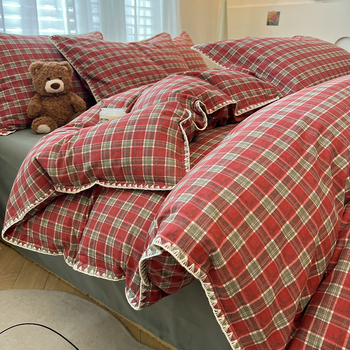 Cetverodijelni set posteljine od 100% pamuka s brušenom teksturom i rubom u obliku školjke, kategorija majka i dijete