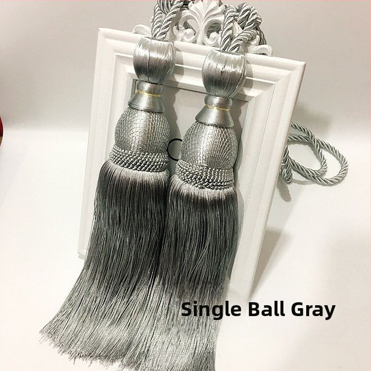 Aizkaru aukli - zelta stieples bumbiņa ar pušķi (audums)