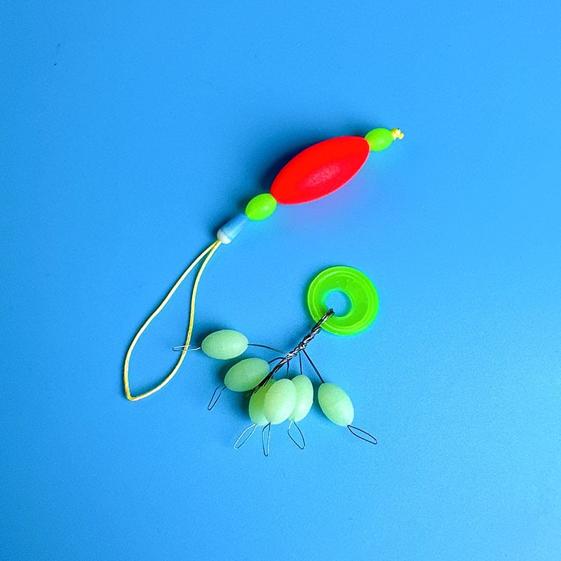 Makšķerēšanas līnijas piederums ar pastiprinošu stieni, luminescējošu pērlīti un galvenās līnijas savienotāju