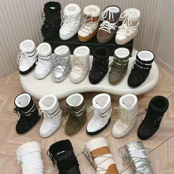 Snieginiai batai, vandeniui atsparūs, neslysta, šilti, lengvi — viršus: down audinys, aukštas viršūnės, padas: guma, vidpadis: avies kailis, kulno aukštis 4,5 cm