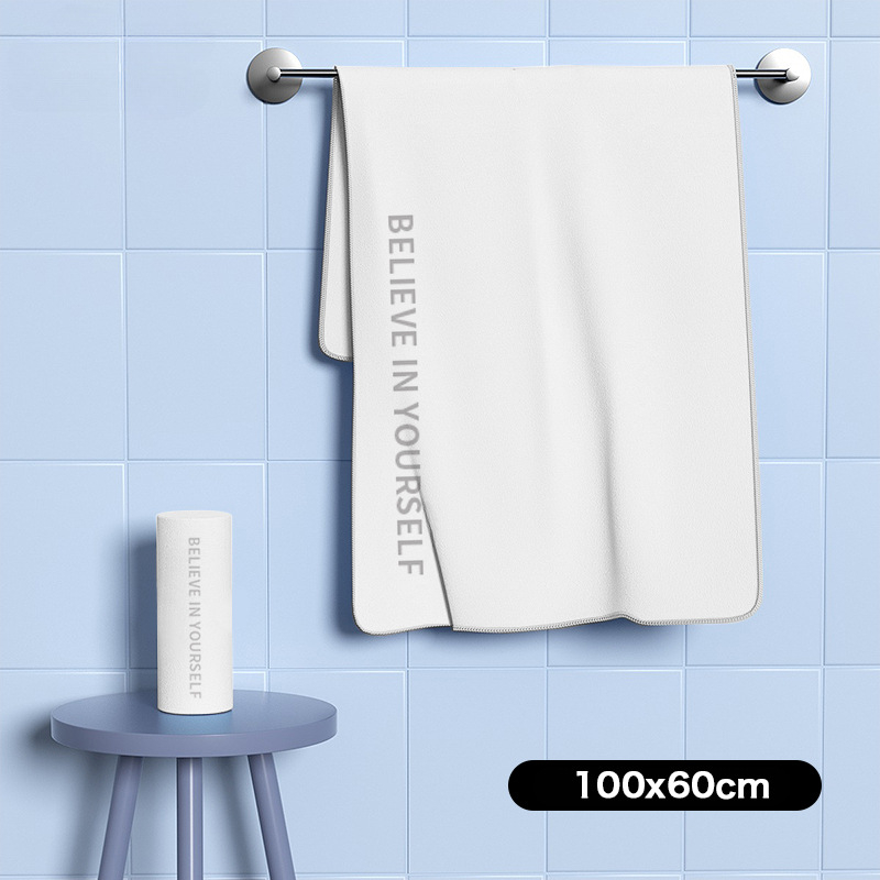 Nēsājamais mikroviļņu dvieļu pludmales pončo – ātri žūst, viegls, ar pogu kapuci; Materiāls: mikrofibra; Svars zem 100 g; Diegs: 150D; Jacquard aušana