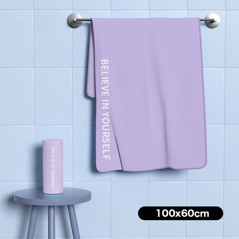 Nēsājamais mikroviļņu dvieļu pludmales pončo – ātri žūst, viegls, ar pogu kapuci; Materiāls: mikrofibra; Svars zem 100 g; Diegs: 150D; Jacquard aušana