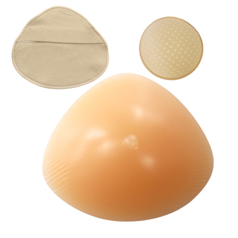 Постоперативна силиконова бюст-протеза с предпазен калъф, триъгълна и кръгла форма, конкавно дъно; удебелен силикон увеличава обема.