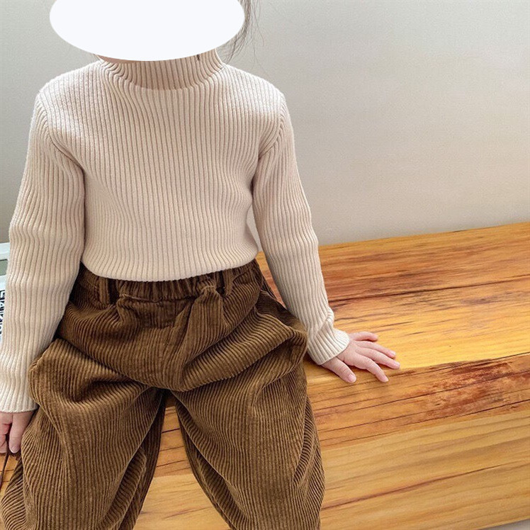 Vaikiška megztinė palaidinė korėjietišku stiliumi, 30% medvilnė, pusiau aukštas kaklas, ribiniai raštai, ilgos rankovės