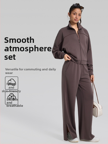 Moterų dviejų dalių komplektas su laisvo kirpimo plačiomis kelnėmis ir džemperiu; Audinys: modal; Sezonos: žiema, pavasaris, ruduo; Stilius: sportas, laisvalaikis, retro