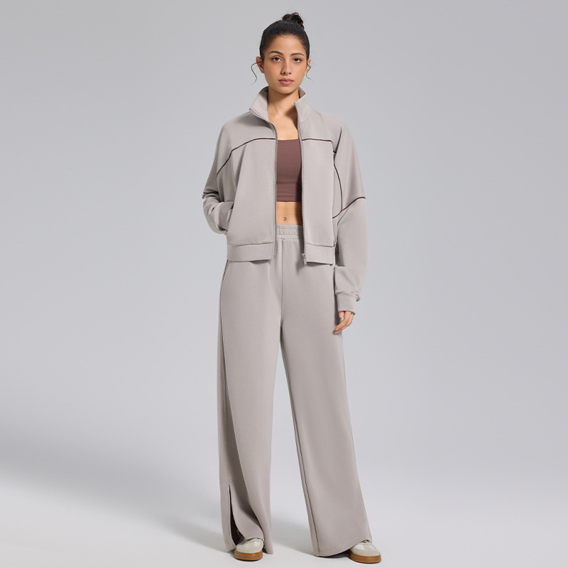 Moterų dviejų dalių komplektas su laisvo kirpimo plačiomis kelnėmis ir džemperiu; Audinys: modal; Sezonos: žiema, pavasaris, ruduo; Stilius: sportas, laisvalaikis, retro