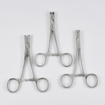 Vienreizējās lietošanas ādas punkcijas iekārta piercingam, akrila korpuss, nerūsējošā tērauda apstrāde, garš ovāls siluets, Dreamlee zīmols