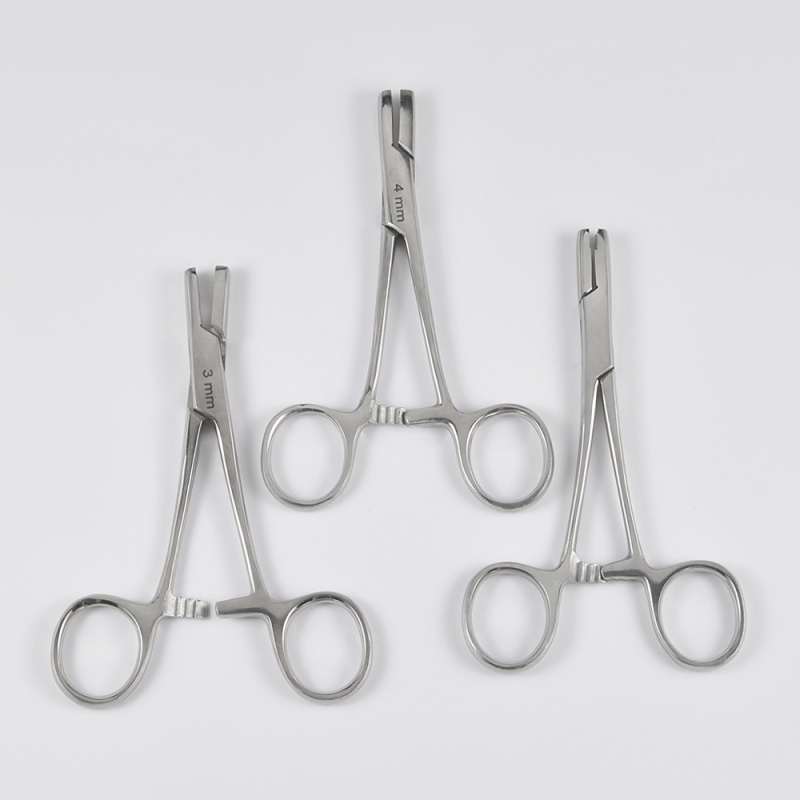 Vienreizējās lietošanas ādas punkcijas iekārta piercingam, akrila korpuss, nerūsējošā tērauda apstrāde, garš ovāls siluets, Dreamlee zīmols