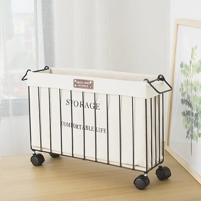 Пасторална метална кошница за съхранение с колела за пътуване