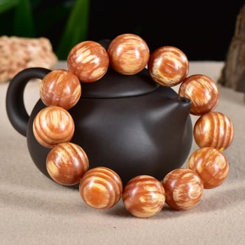 108 gyöngyös kínai stílusú karkötő Blood Dragon Woodból borostyán betétekkel