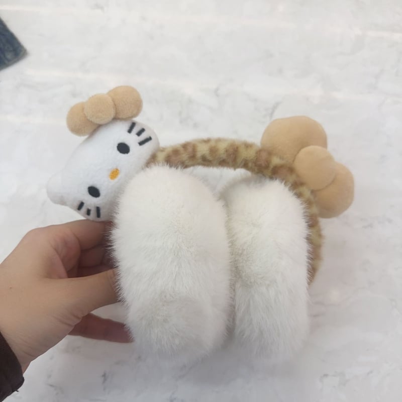 Plüüsist kõrvakaitsed karikatuuristiiliga, monokromaatne muster, talvise soojus