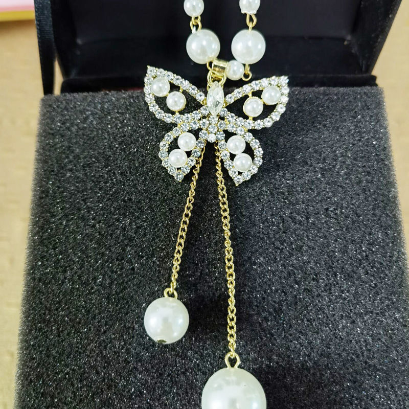 Ilga megztinio grandinėlė su perlų karoliukais, karolių grandinė, ilgis 51–80 cm, pakabukas iš lydinio