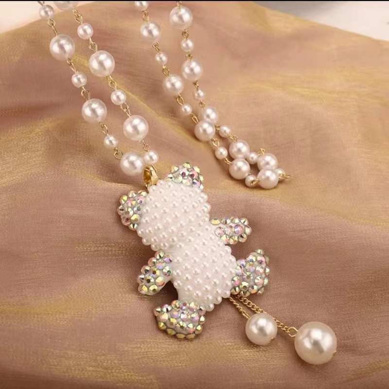 Ilga megztinio grandinėlė su perlų karoliukais, karolių grandinė, ilgis 51–80 cm, pakabukas iš lydinio