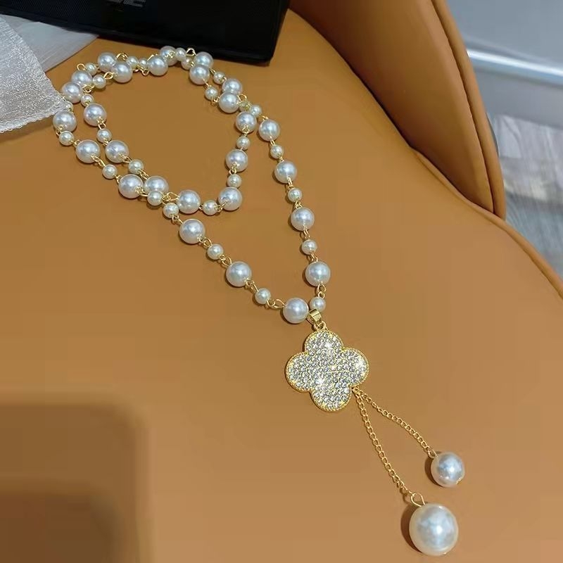 Ilga megztinio grandinėlė su perlų karoliukais, karolių grandinė, ilgis 51–80 cm, pakabukas iš lydinio