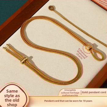 Rankų mezginiai jadeito pakabukas su virvele, su aštuonių lobynų kompasu, taikos motyvu ir moliūgo akcentu (Kilmė: Lianyungang; Medžiaga: medvilnė ir linas; Apdorojimas: rankinis mezginys)