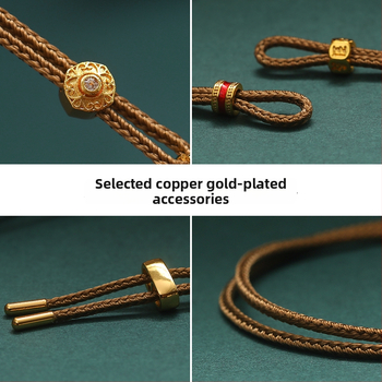 Rankų mezginiai jadeito pakabukas su virvele, su aštuonių lobynų kompasu, taikos motyvu ir moliūgo akcentu (Kilmė: Lianyungang; Medžiaga: medvilnė ir linas; Apdorojimas: rankinis mezginys)