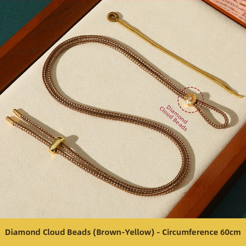 Rankų mezginiai jadeito pakabukas su virvele, su aštuonių lobynų kompasu, taikos motyvu ir moliūgo akcentu (Kilmė: Lianyungang; Medžiaga: medvilnė ir linas; Apdorojimas: rankinis mezginys)