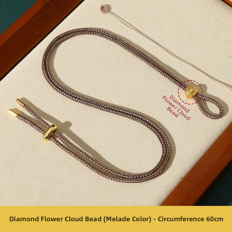 Rankų mezginiai jadeito pakabukas su virvele, su aštuonių lobynų kompasu, taikos motyvu ir moliūgo akcentu (Kilmė: Lianyungang; Medžiaga: medvilnė ir linas; Apdorojimas: rankinis mezginys)