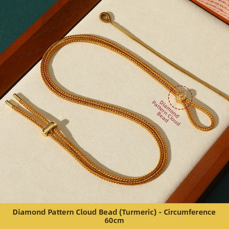 Rankų mezginiai jadeito pakabukas su virvele, su aštuonių lobynų kompasu, taikos motyvu ir moliūgo akcentu (Kilmė: Lianyungang; Medžiaga: medvilnė ir linas; Apdorojimas: rankinis mezginys)