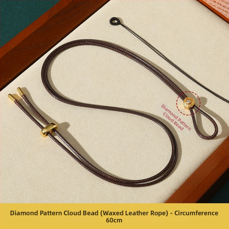 Rankų mezginiai jadeito pakabukas su virvele, su aštuonių lobynų kompasu, taikos motyvu ir moliūgo akcentu (Kilmė: Lianyungang; Medžiaga: medvilnė ir linas; Apdorojimas: rankinis mezginys)