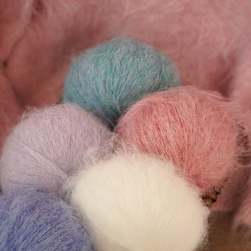 Keverék fonal kézi kötéshez – alpakka és mohír hosszú szálas keverék; gyűrűs sodrás; fonal forma: csoport; Mu Pai
