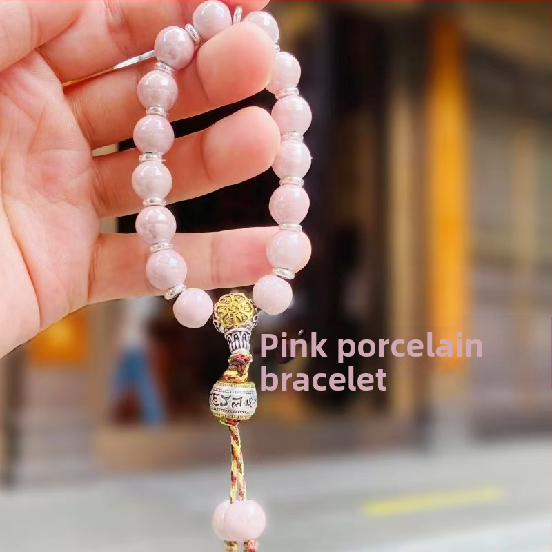 Rokassprādze palātas stilā ar keramikas pērļām un teksta burtiem, rokām austā