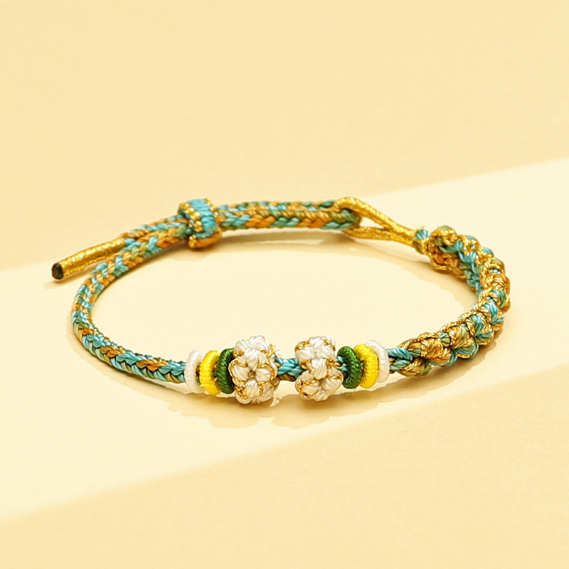 Unisex narukvica kineskog stila, ručno izrađena na crvenoj užadi - ukras za ruku