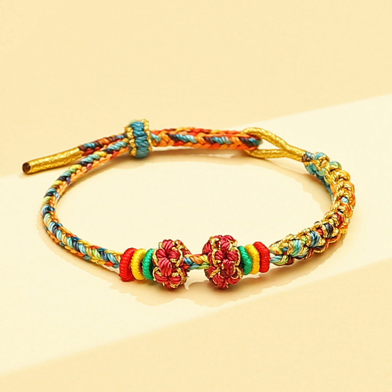 Unisex narukvica kineskog stila, ručno izrađena na crvenoj užadi - ukras za ruku