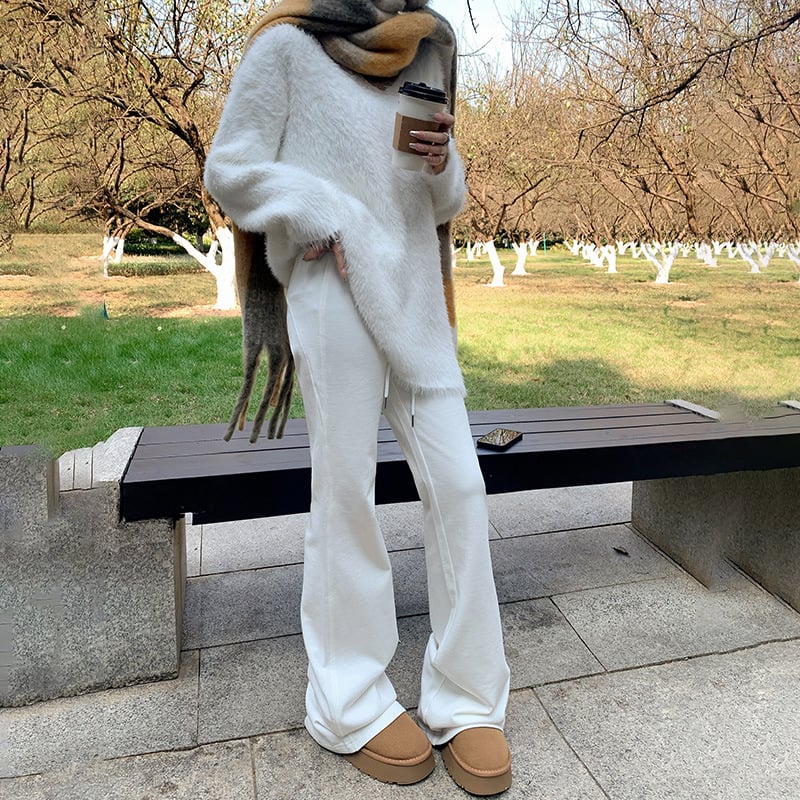 Moteriškos sportinės kelnės su švelniai išsiplėšiančiu kelniu, žieminis fliso pamušalas, žemas juosmuo, ilgos iki grindų, poliesterio–medvilnės mišinys