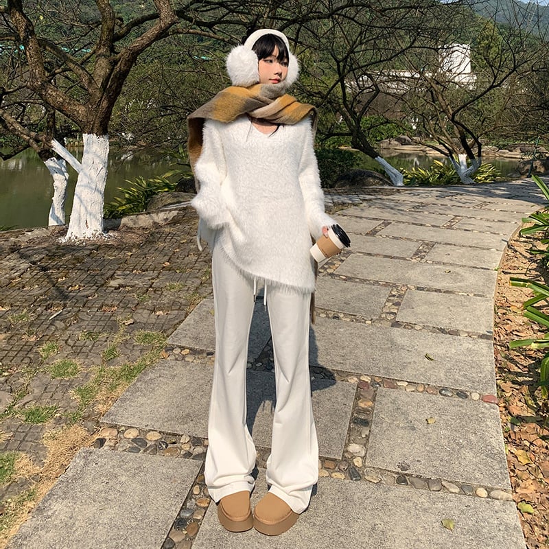 Moteriškos sportinės kelnės su švelniai išsiplėšiančiu kelniu, žieminis fliso pamušalas, žemas juosmuo, ilgos iki grindų, poliesterio–medvilnės mišinys