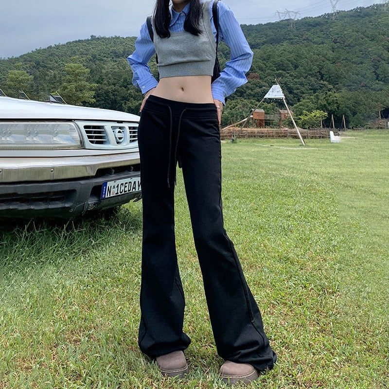 Moteriškos sportinės kelnės su švelniai išsiplėšiančiu kelniu, žieminis fliso pamušalas, žemas juosmuo, ilgos iki grindų, poliesterio–medvilnės mišinys