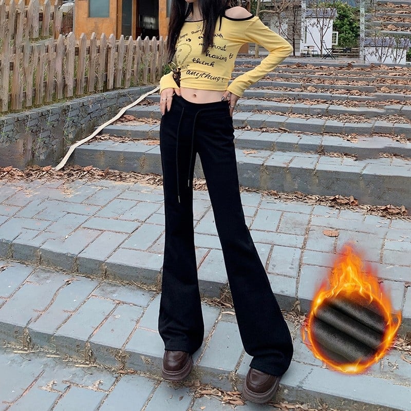 Moteriškos sportinės kelnės su švelniai išsiplėšiančiu kelniu, žieminis fliso pamušalas, žemas juosmuo, ilgos iki grindų, poliesterio–medvilnės mišinys