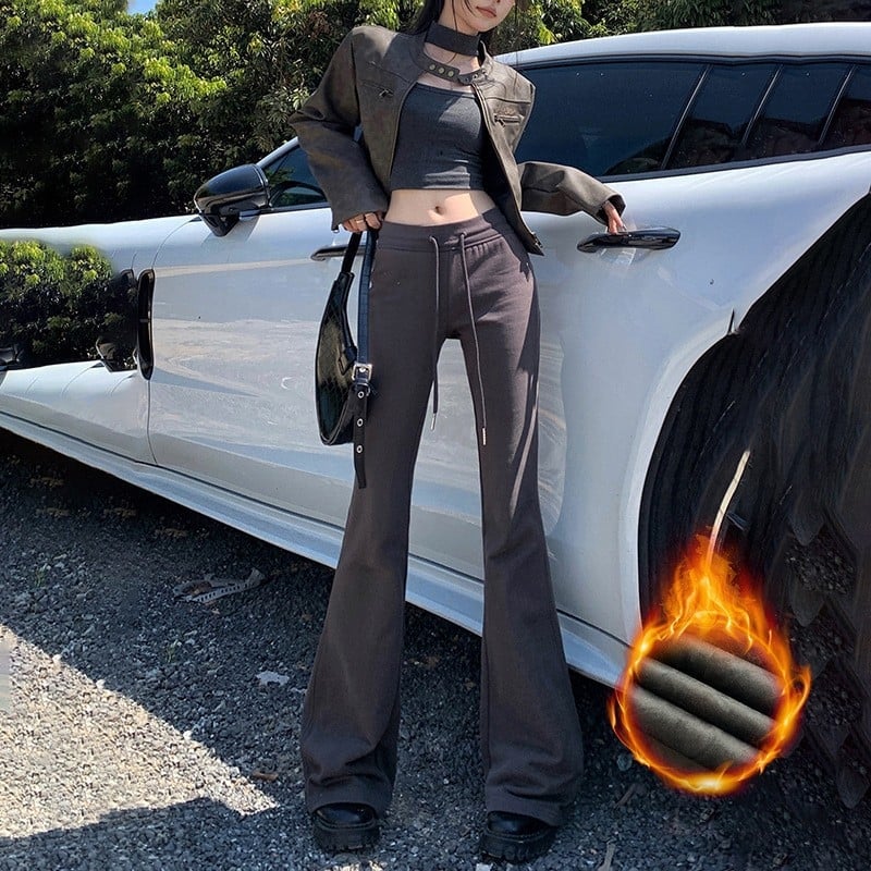 Moteriškos sportinės kelnės su švelniai išsiplėšiančiu kelniu, žieminis fliso pamušalas, žemas juosmuo, ilgos iki grindų, poliesterio–medvilnės mišinys