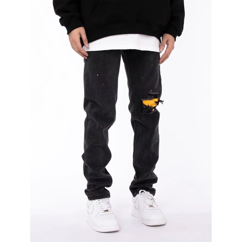 Eiropas un amerikāņu retro stila saplēstas džinsa bikses ar krāsas šļakatām, ielas stils, tievējošas, karsta vasara, vēsas un brīvas, modernas melnas bikses.