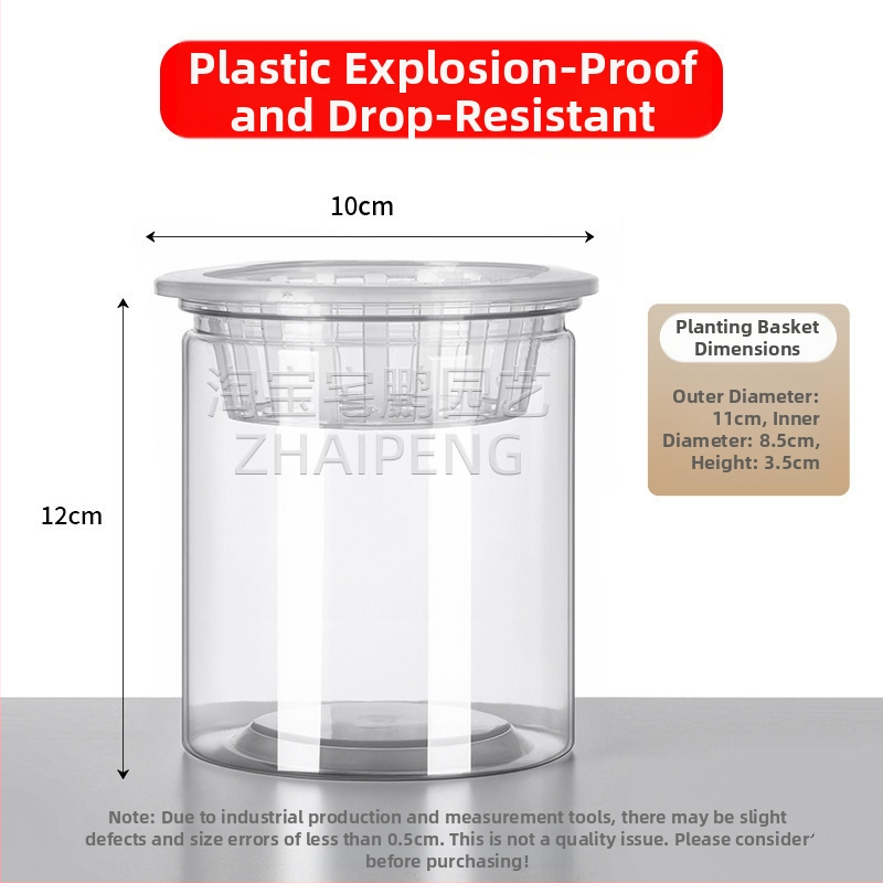 Caurspīdīgs plastmasas cilindrisks hydroponiskais pods sēklām un maziem augiem, stāvošs uz grīdas ar stādīšanas grozu, domāts mājas un dārza lietošanai