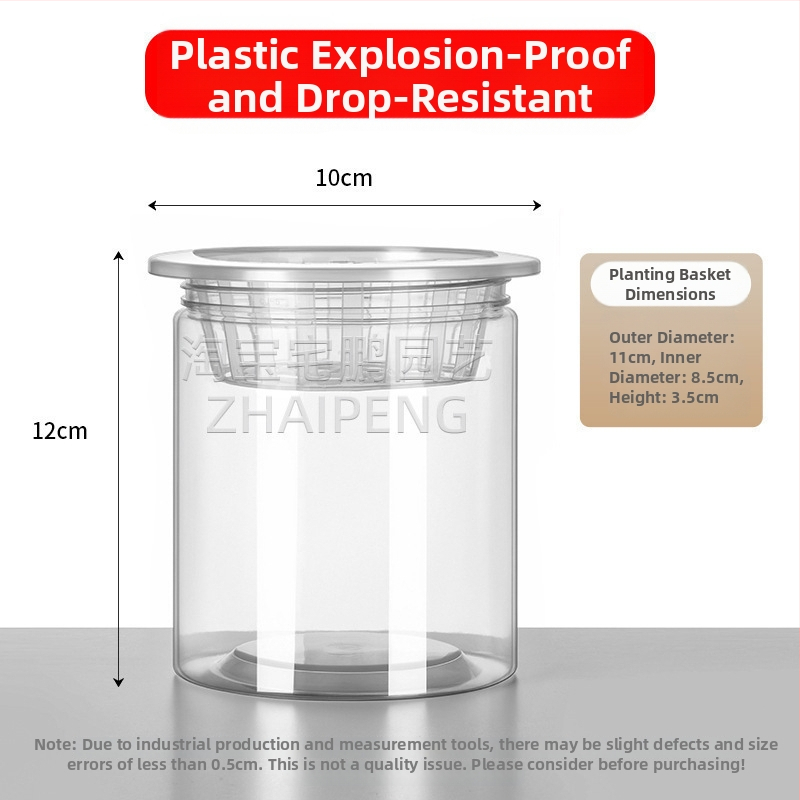 Caurspīdīgs plastmasas cilindrisks hydroponiskais pods sēklām un maziem augiem, stāvošs uz grīdas ar stādīšanas grozu, domāts mājas un dārza lietošanai