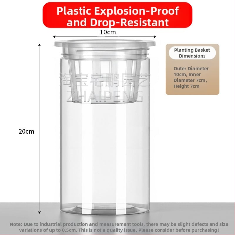 Caurspīdīgs plastmasas cilindrisks hydroponiskais pods sēklām un maziem augiem, stāvošs uz grīdas ar stādīšanas grozu, domāts mājas un dārza lietošanai